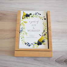 Load image into Gallery viewer, A Year of Joy and Worship: A Selection of 52 Weekly Scripture Verse Cards in wood storage tray with stand.