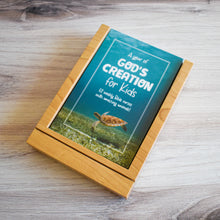 Load image into Gallery viewer, A Year of God's Creation for Kids: 52 Weekly Bible verses with amazing animals in wooden stand for kids room.