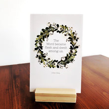 Load image into Gallery viewer, The Word became flesh and dwelt among us.  John 1:14a  Advent Devotional for Kids with Scripture cards in wood stand.