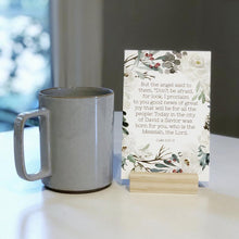 Load image into Gallery viewer, But the angel said to them, "Don't be afraid, for look, I proclaim to you good news of great joy that will be for all the people: Today in the city of David a Savior was born for you, who is the Messiah, the Lord. Luke 2:10-11 Advent Devotional for Kids with Bible verses for each day.