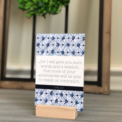 For I will give you such words and a wisdomthat none of your adversaries will be able to resist or contradict. Luke 21:15 Scripture card with stand and blue watercolor artwork.