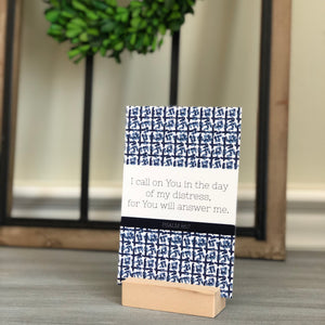 I call on You in the day of my distress for You will answer me.  Psalm 86:7 Memory Verse Card with stand and blue artwork.